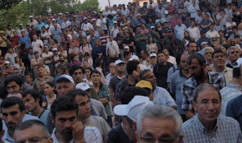 KESK members gather outside a courthouse following the arrests in 2012