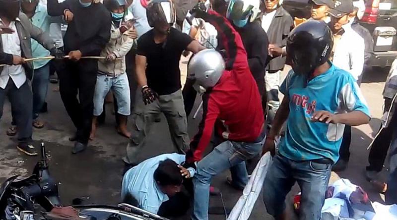 Workers being attacked. Photo: Licadho-Cambodia