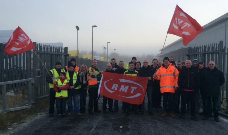 Mick Ward (left of banner) and other protesters at Motherwell City Link depot