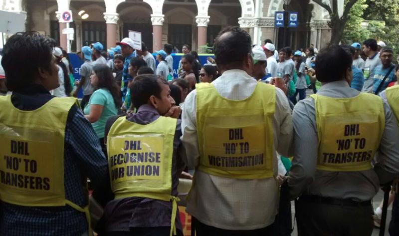 DHL workers and activists protest at Mumbai Marathon