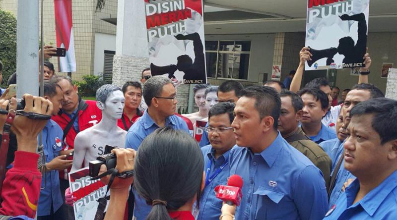 Nova Hakim, JICT Union chair, addresses workers at July protest 