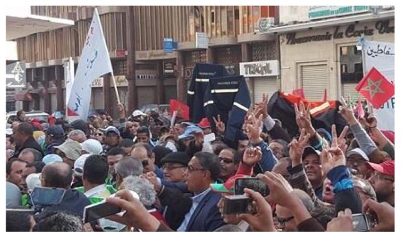 UMT general secretary Al Mukharek (centre) at the demonstration